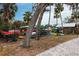 A storage rack filled with colorful kayaks next to a covered picnic area at 3826 E 155Th E Ave, Parrish, FL 34219
