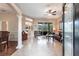 Inviting living room with tile floors, natural light, and neutral tones, perfect for comfortable living and entertaining at 3826 E 155Th E Ave, Parrish, FL 34219