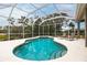Sparkling pool in screened enclosure provides a relaxing outdoor retreat at 3826 E 155Th E Ave, Parrish, FL 34219