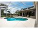 Inviting pool with covered lanai and patio for relaxing and entertaining at 3826 E 155Th E Ave, Parrish, FL 34219