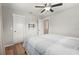 Neutral bedroom featuring wood-look floors and crisp white trim and doors at 6708 Keystone Dr, Sarasota, FL 34231