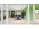 The spacious dining room boasts tile floors and decorative columns at 7056 Hawks Harbor Cir, Bradenton, FL 34207