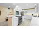 Kitchen features stainless steel appliances, sleek countertops, and ample cabinet space at 7056 Hawks Harbor Cir, Bradenton, FL 34207