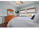 Comfortable bedroom with a dresser, and windows with views, offering a serene space at 718 Key Royale Dr, Holmes Beach, FL 34217