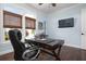 Comfortable home office with dark wood desk and modern executive chair at 718 Key Royale Dr, Holmes Beach, FL 34217