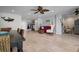 Open living area with tile flooring, comfortable seating, and ample space for entertaining at 718 Key Royale Dr, Holmes Beach, FL 34217