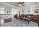 Inviting living room with leather seating and hardwood floors at 718 Key Royale Dr, Holmes Beach, FL 34217