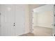 Bright entryway features a double door with entry to a room and wood-style floors at 8528 Beechlake Ct, Sarasota, FL 34240