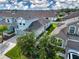 Aerial view of this well-maintained home nestled in a vibrant community featuring landscaped yards and neat homes at 11728 Meadowgate Pl, Bradenton, FL 34211