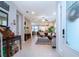 Bright and open living area with tile flooring, a cozy seating area, and lots of natural light at 11728 Meadowgate Pl, Bradenton, FL 34211