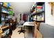 Large storage space with metal shelving and neatly organized items, including clothing and household goods at 11728 Meadowgate Pl, Bradenton, FL 34211