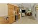 Dining room with custom built-ins, wine refrigerator, and seating area at 124 Ventana Way, Venice, FL 34292