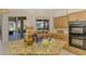 Kitchen with granite counters, built-in appliances, and outdoor views from the kitchen window at 124 Ventana Way, Venice, FL 34292