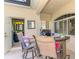 Outdoor bar area with seating, offering a convenient space for entertaining guests at 124 Ventana Way, Venice, FL 34292