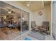 Enclosed balcony seating area, perfect for enjoying the weather at 1600 1St W Ave # 304A, Bradenton, FL 34205