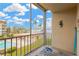 Balcony view overlooking pool area and beautiful open water views in the distance at 1600 1St W Ave # 304A, Bradenton, FL 34205