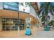 Inviting exterior of a commercial building with modern architecture, palm trees, and 'Downtown Bradenton' signage at 1600 1St W Ave # 304A, Bradenton, FL 34205