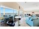 Spacious condo living area with floor to ceiling views of the waterfront at 1600 1St W Ave # 304A, Bradenton, FL 34205