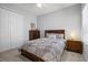 Well-lit bedroom features a ceiling fan, a large closet, and a nightstand at 2722 Sapphire Blue Ln, Bradenton, FL 34211