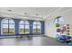 Recreation room with ping pong table, yoga mats, fitness balls, and ample space at 2722 Sapphire Blue Ln, Bradenton, FL 34211