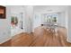 Elegant dining room with a round table, seating for six, and large windows providing plenty of natural light at 3540 Bayou Cir, Longboat Key, FL 34228