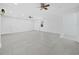 Spacious living room with tile floors, neutral tones, and ample natural light at 3540 Bayou Cir, Longboat Key, FL 34228