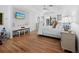 Bright and airy main bedroom with hardwood floors, tray ceiling, and plenty of natural light at 3540 Bayou Cir, Longboat Key, FL 34228