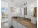 A vessel sink is the focal point of this modern vanity with a large mirror at 3540 Bayou Cir, Longboat Key, FL 34228