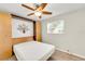Bedroom with wood-look floors and built-in Murphy bed at 4430 Wynkoop Cir, Port Charlotte, FL 33948