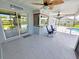 Covered lanai with outdoor seating and a view of the pool at 4430 Wynkoop Cir, Port Charlotte, FL 33948