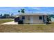 View of the house backyard featuring a small patio at 4444 Los Rios St, North Port, FL 34287