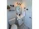 Bright bathroom with a vanity, modern fixtures, and decorative touches at 4444 Los Rios St, North Port, FL 34287