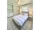 Comfortable bedroom featuring a cozy bed, natural light, and ample closet space at 4444 Los Rios St, North Port, FL 34287