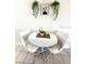 Cozy dining area with a modern round table and comfortable seating for two at 4444 Los Rios St, North Port, FL 34287