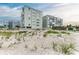 Beachfront condos offer serene coastal living with stunning views and convenient access to sandy shores at 5200 Gulf Dr # 601, Holmes Beach, FL 34217