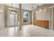Dining room area with a large arch window and a built-in buffet at 5383 Creekside Trl, Sarasota, FL 34243