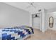 Bright bedroom with tile floors and closet at 5889 Canal Dr # I4, Bradenton, FL 34207