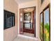 Bright and inviting foyer featuring tile flooring and stylish decor at 6420 13Th Avenue W Dr, Bradenton, FL 34209