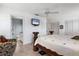 Bright bedroom with ensuite bathroom, large closet, and decorative furniture at 6420 13Th Avenue W Dr, Bradenton, FL 34209