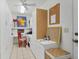 Organized office with built-in cabinets, desk space, and natural light at 6420 13Th Avenue W Dr, Bradenton, FL 34209
