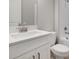 Well-lit bathroom featuring a white vanity, contemporary fixtures, and a tiled shower/tub combination at 8024 Moonbeam Ave, Sarasota, FL 34241