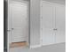 Interior view showcasing a pair of white doors and a single doorway at 8024 Moonbeam Ave, Sarasota, FL 34241