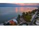 Coastal neighborhood view features stunning waterfront homes, a beach, and ocean views at 915 N Shore Dr, Anna Maria, FL 34216