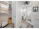 A spa-like bathroom with a glass-enclosed shower, sleek fixtures, and modern design at 915 N Shore Dr, Anna Maria, FL 34216