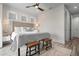 Bedroom with stylish decor featuring a king bed and decorative furniture at 915 N Shore Dr, Anna Maria, FL 34216