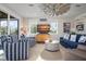 Cozy living room with coastal decor, comfortable seating, and ample natural light at 915 N Shore Dr, Anna Maria, FL 34216