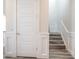 Staircase featuring modern trim and elegant details, leading to the next level at 915 N Shore Dr, Anna Maria, FL 34216