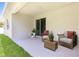 Outdoor patio with modern patio furniture, including stylish chairs and a coffee table, ideal for relaxation at 1342 Shaker Ln, North Port, FL 34286