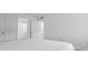 Minimalist bedroom with open view to adjacent bathroom at 3201 Beneva Rd # 204, Sarasota, FL 34232