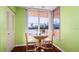 Cozy breakfast nook with a sunlit window and comfortable seating, perfect for enjoying morning meals at 4570 Pinebrook Cir # 303, Bradenton, FL 34209